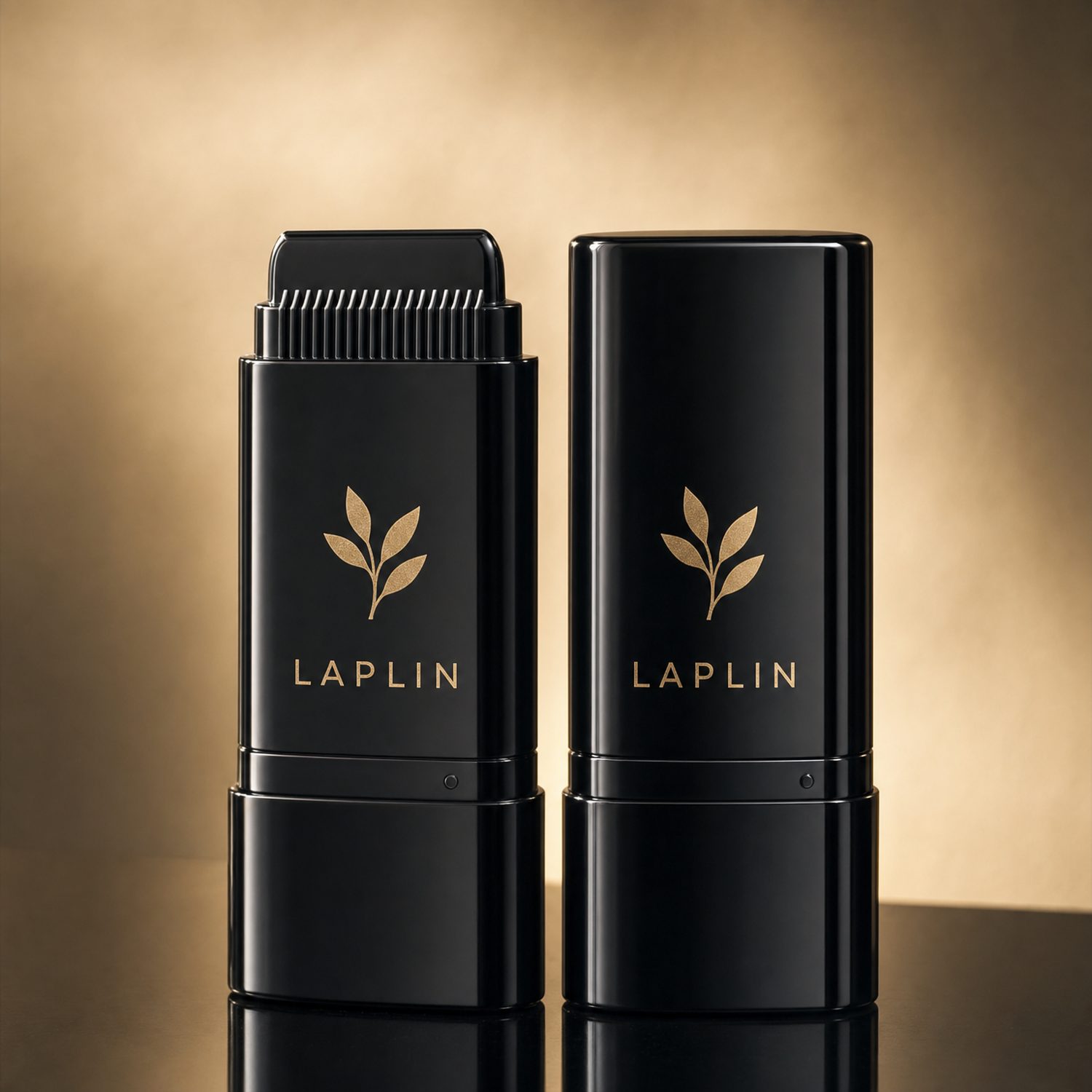 Two glossy black LAPLIN color-comb sticks.